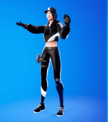 A Woman Is Standing In Front Of A Blue Background Wearing A Black Hoodie And Black Pants . GIF