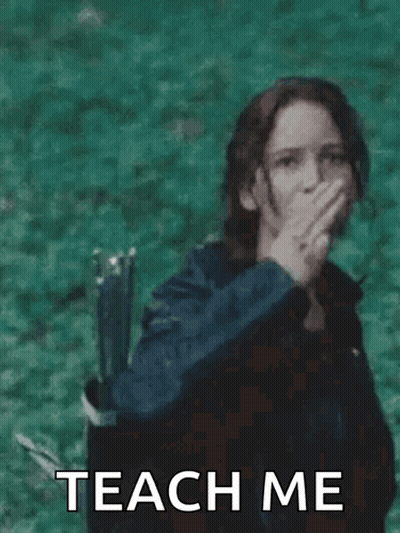 A Woman Is Standing In Front Of A Body Of Water Giving The Middle Finger . GIF