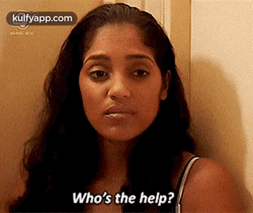 A Woman Is Standing In Front Of A Door And Asking Who 'S The Help ? GIF
