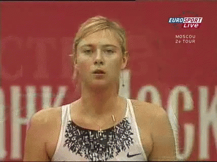 A Woman Is Standing In Front Of A Eurosport Live Sign GIF