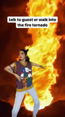 A Woman Is Standing In Front Of A Fire Tornado With The Words Talk To Guest Or Walk Into The Fire Tornado Above Her GIF