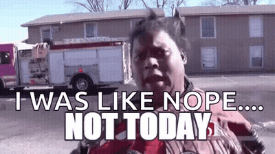 A Woman Is Standing In Front Of A Fire Truck With The Words `` I Was Like Nope ... Not Today '' Written On It . GIF