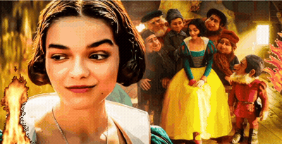 A Woman Is Standing In Front Of A Group Of People GIF