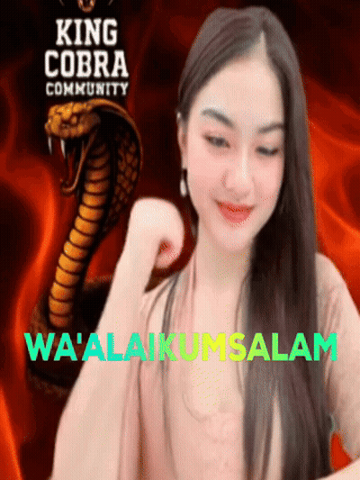 A Woman Is Standing In Front Of A King Cobra Community Logo GIF