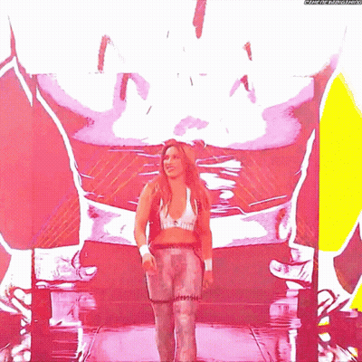 A Woman Is Standing In Front Of A Large Screen That Says Meme-The-Metastar GIF