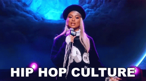 A Woman Is Standing In Front Of A Microphone Holding A Microphone . GIF