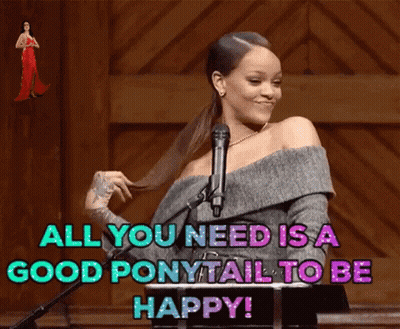 A Woman Is Standing In Front Of A Microphone With The Words " All You Need Is A Good Ponytail To Be Happy " GIF