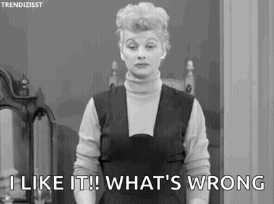 A Woman Is Standing In Front Of A Mirror And Saying `` I Like It What 'S Wrong '' . GIF