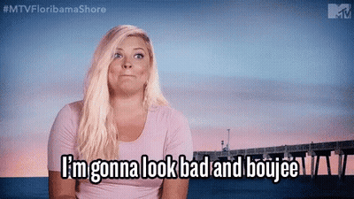 A Woman Is Standing In Front Of A Pier And Says `` I 'M Gonna Look Bad And Boujee '' GIF