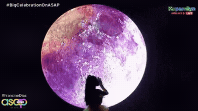 A Woman Is Standing In Front Of A Purple Full Moon With The Hashtag #Bigcelebration On Asap GIF
