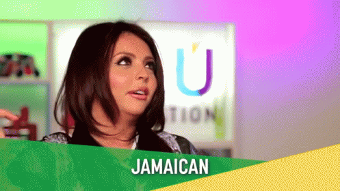 A Woman Is Standing In Front Of A Sign That Says Jamaican On It GIF
