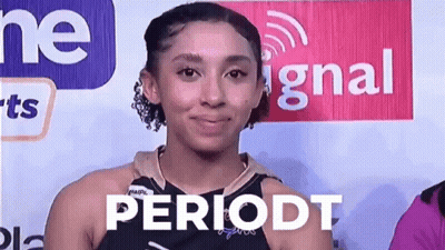 A Woman Is Standing In Front Of A Sign That Says Periodt GIF