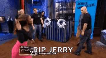 A Woman Is Standing In Front Of A Sign That Says Rip Jerry On It GIF