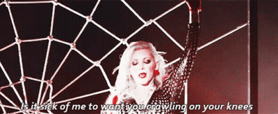 A Woman Is Standing In Front Of A Spider Web And Says Is It Sick Of Me GIF