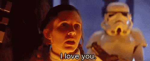 A Woman Is Standing In Front Of A Stormtrooper And Saying `` I Love You '' . GIF