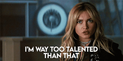 A Woman Is Standing In Front Of A Target And Says `` I 'M Way Too Talented Than That '' . GIF