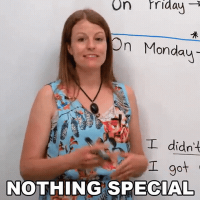 A Woman Is Standing In Front Of A Whiteboard With The Words Nothing Special Written On It GIF