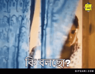 A Woman Is Standing In Front Of A Window With The Words ' Gifgari.com ' On The Bottom Of The Screen . GIF