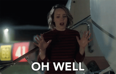 A Woman Is Standing In Front Of An Airplane With Her Hands Outstretched And The Words Oh Well Above Her GIF