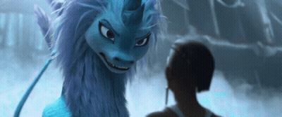 A Woman Is Standing Next To A Blue Dragon With A Unicorn Horn . GIF