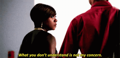 A Woman Is Standing Next To A Man In A Red Shirt And Saying `` What You Don 'T Understand Is Not My Concern '' . GIF