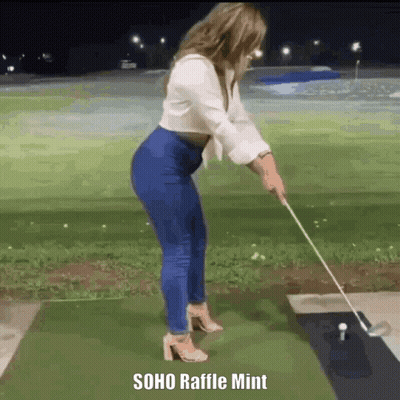 A Woman Is Swinging A Golf Club On A Golf Course With The Caption Soho Raffle Mint . GIF