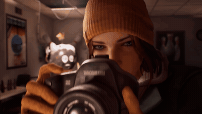 A Woman Is Taking A Picture With A Camera That Says Tamron On It GIF