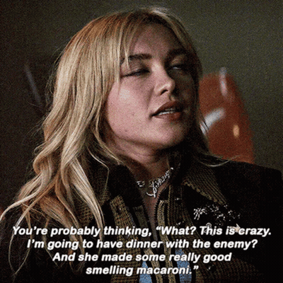 A Woman Is Talking About Dinner With The Enemy GIF