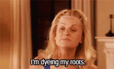 A Woman Is Talking About Dyeing Her Roots . GIF
