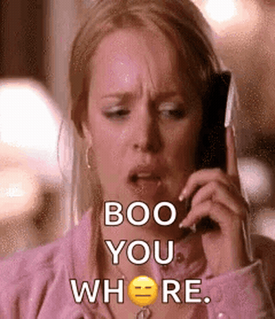 A Woman Is Talking On A Cell Phone And Says `` Boo You Where '' . GIF