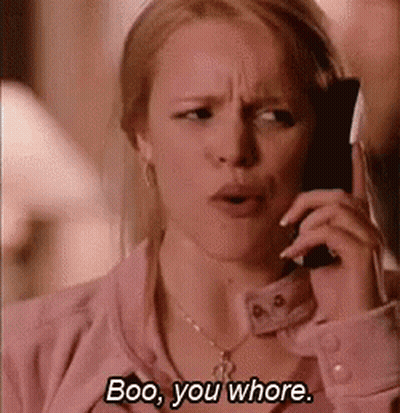 A Woman Is Talking On A Cell Phone And Says `` Boo , You Whore '' . GIF