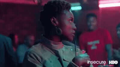 A Woman Is Talking On A Cell Phone And The Word Awkward Is On The Screen GIF