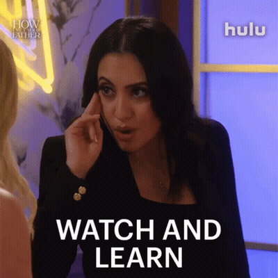 A Woman Is Talking On A Cell Phone And The Words Watch And Learn Are On The Screen GIF