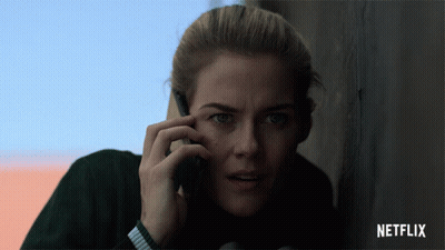 A Woman Is Talking On A Cell Phone With A Netflix Logo In The Corner GIF