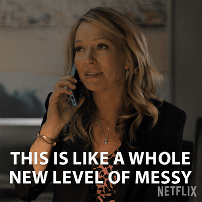 A Woman Is Talking On A Cell Phone With The Caption " This Is Like A Whole New Level Of Messy " GIF