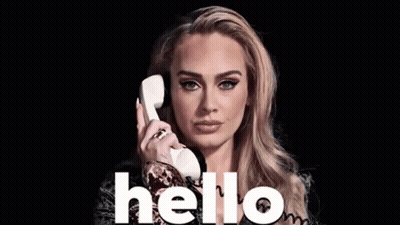 A Woman Is Talking On A Telephone With The Word Hello Written On The Bottom GIF
