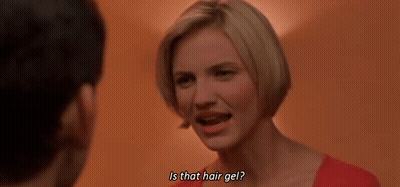 A Woman Is Talking To A Man And Asking If That Hair Gel Is That Hair Gel . GIF