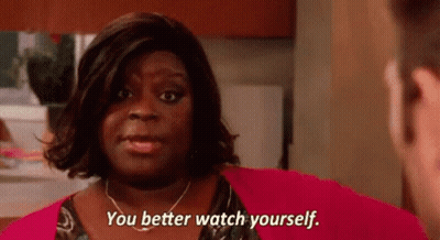 A Woman Is Talking To A Man And Saying `` You Better Watch Yourself . '' GIF