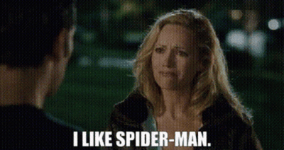 A Woman Is Talking To A Man And Says I Like Spider-Man . GIF