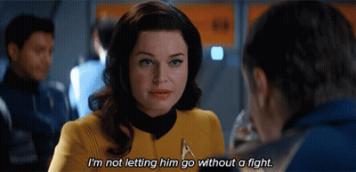 A Woman Is Talking To A Man And Says I 'M Not Letting Him Go Without A Fight GIF