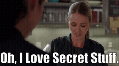 A Woman Is Talking To A Man And Says Oh , I Love Secret Stuff GIF