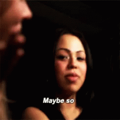 A Woman Is Talking To A Man In A Dark Room And Says Maybe So . GIF