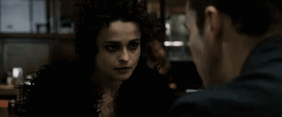 A Woman Is Talking To A Man With The Words " You Have Very Serious Emotional Problems " Below Her GIF
