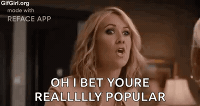 A Woman Is Talking To Another Woman And Says `` Oh I Bet You 'Re Really Popular '' . GIF