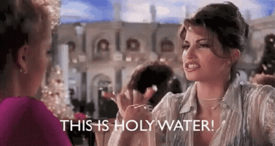 A Woman Is Talking To Another Woman And Says `` This Is Holy Water ! '' GIF