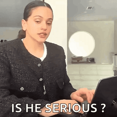 A Woman Is Typing On A Laptop Computer And Asking Is He Serious ? GIF