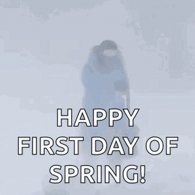 A Woman Is Walking In The Snow With The Words Happy First Day Of Spring GIF
