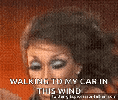 A Woman Is Walking To Her Car In The Wind And Says Walking To My Car In This Wind . GIF