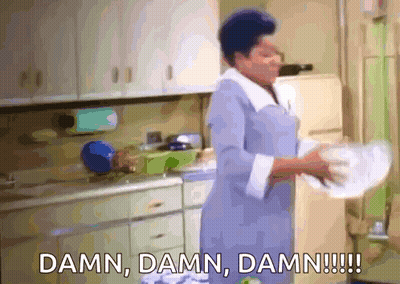 A Woman Is Washing Dishes In A Kitchen And Says Damn Damn Damn GIF