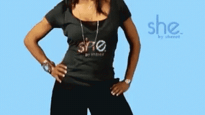 A Woman Is Wearing A Black Shirt That Says She GIF